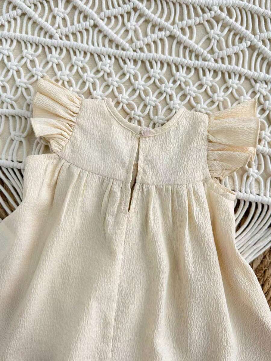 Infant Ivory Short Sleeve Dress - Elegant Textured Fabric for Little Ones