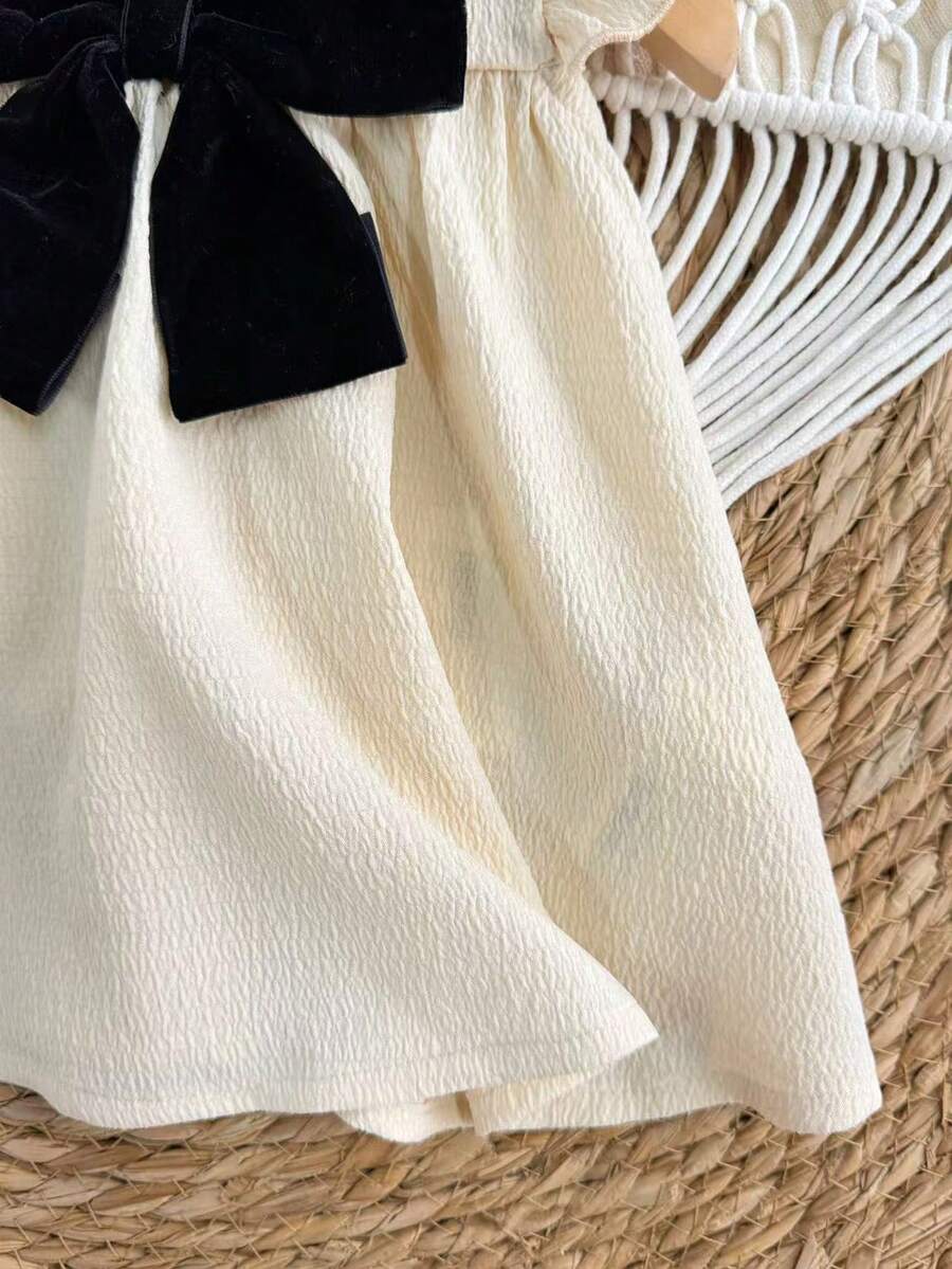 Infant Ivory Short Sleeve Dress - Elegant Textured Fabric for Little Ones