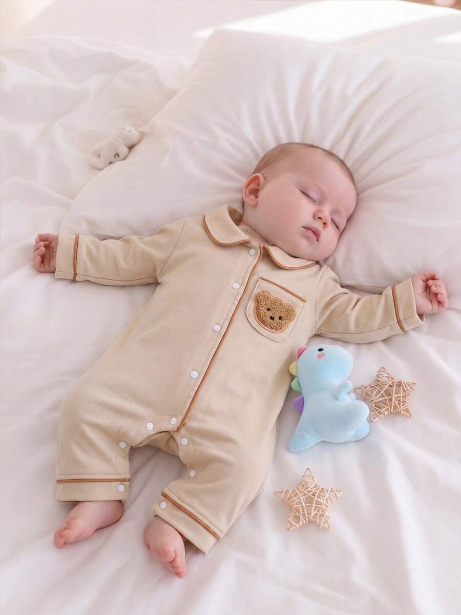 Cartoon Dinosaur Print Baby Romper Pajamas with Drawstring Trim for Comfortable Daily Wear