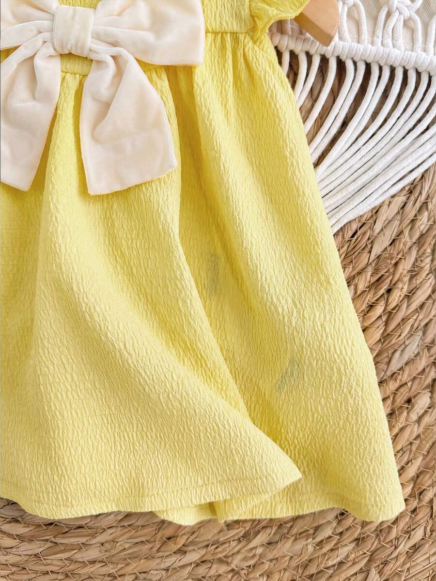 Infant Ivory Short Sleeve Dress - Elegant Textured Fabric for Little Ones